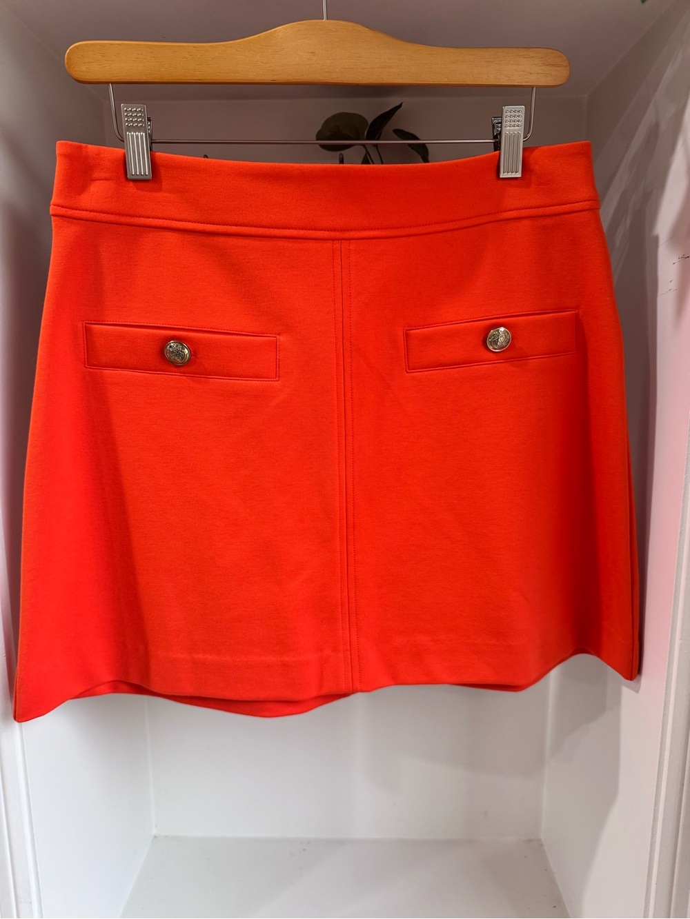 Vibrant Orange Mini Skirt with Front Button Flaps